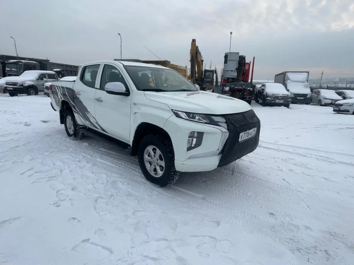 Mitsubishi L200 — фото 1